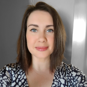 A small headshot picture of Gemma Maris - Freelance Assessor, smiling at the camera